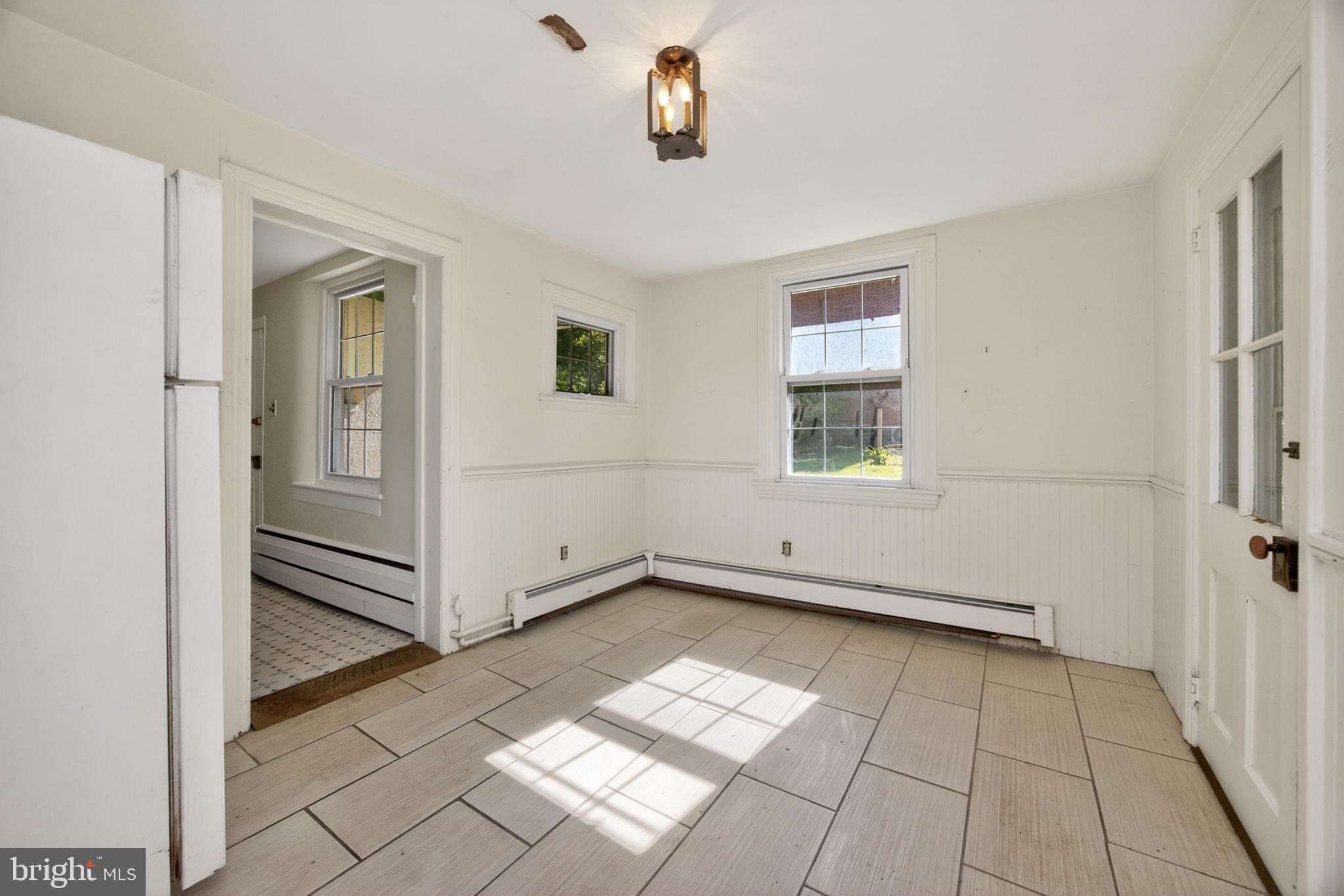 486 West Street Road Kennett Square, PA 19348 - Photo 75 of 85 Enclosed porch or extension to kitchen w/ex door