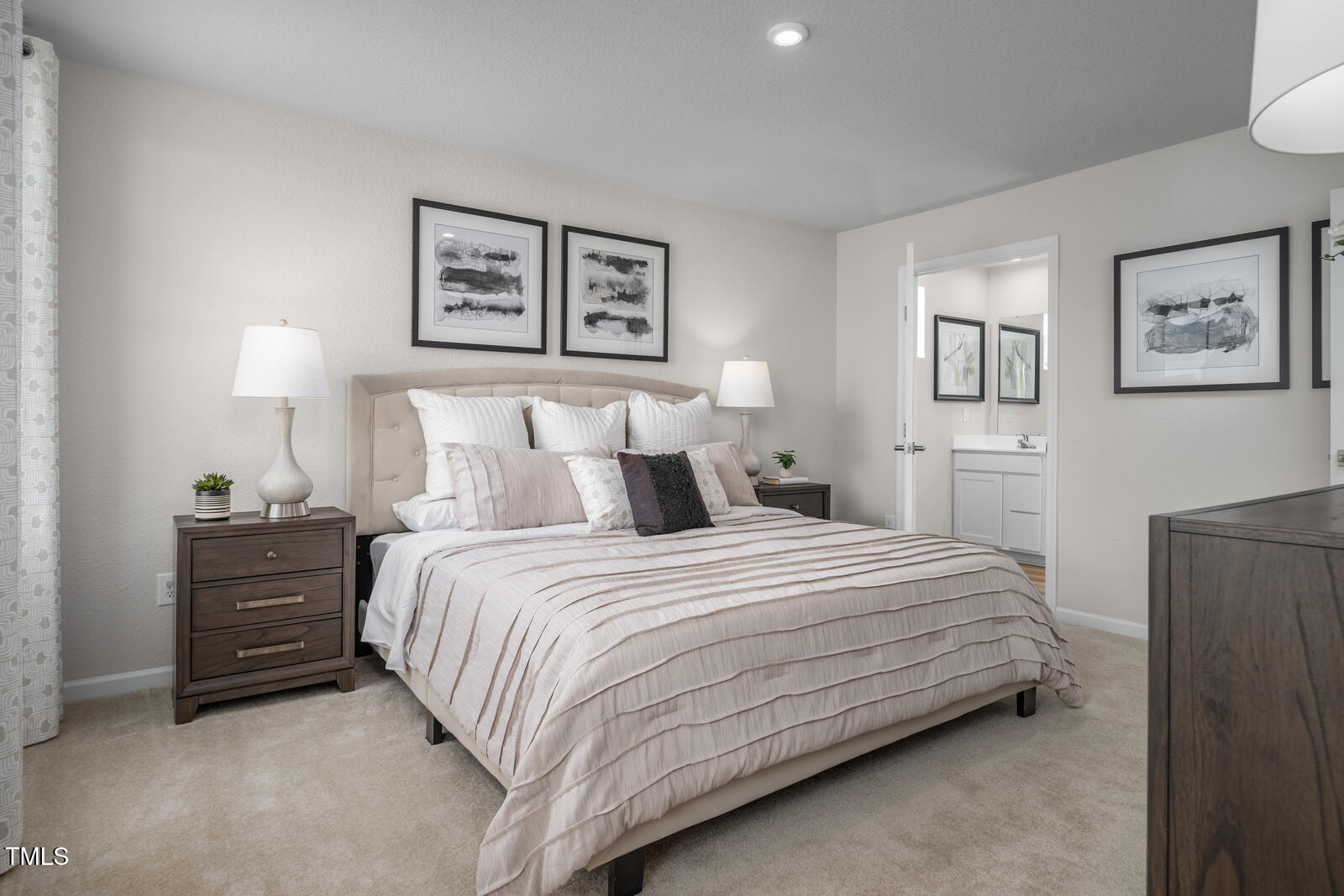 8615 Butterfly Drive Bailey, NC 27807 - Photo 11 of 20 a bedroom with a bed and lamp