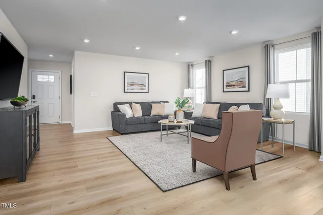a view of living room and dining room