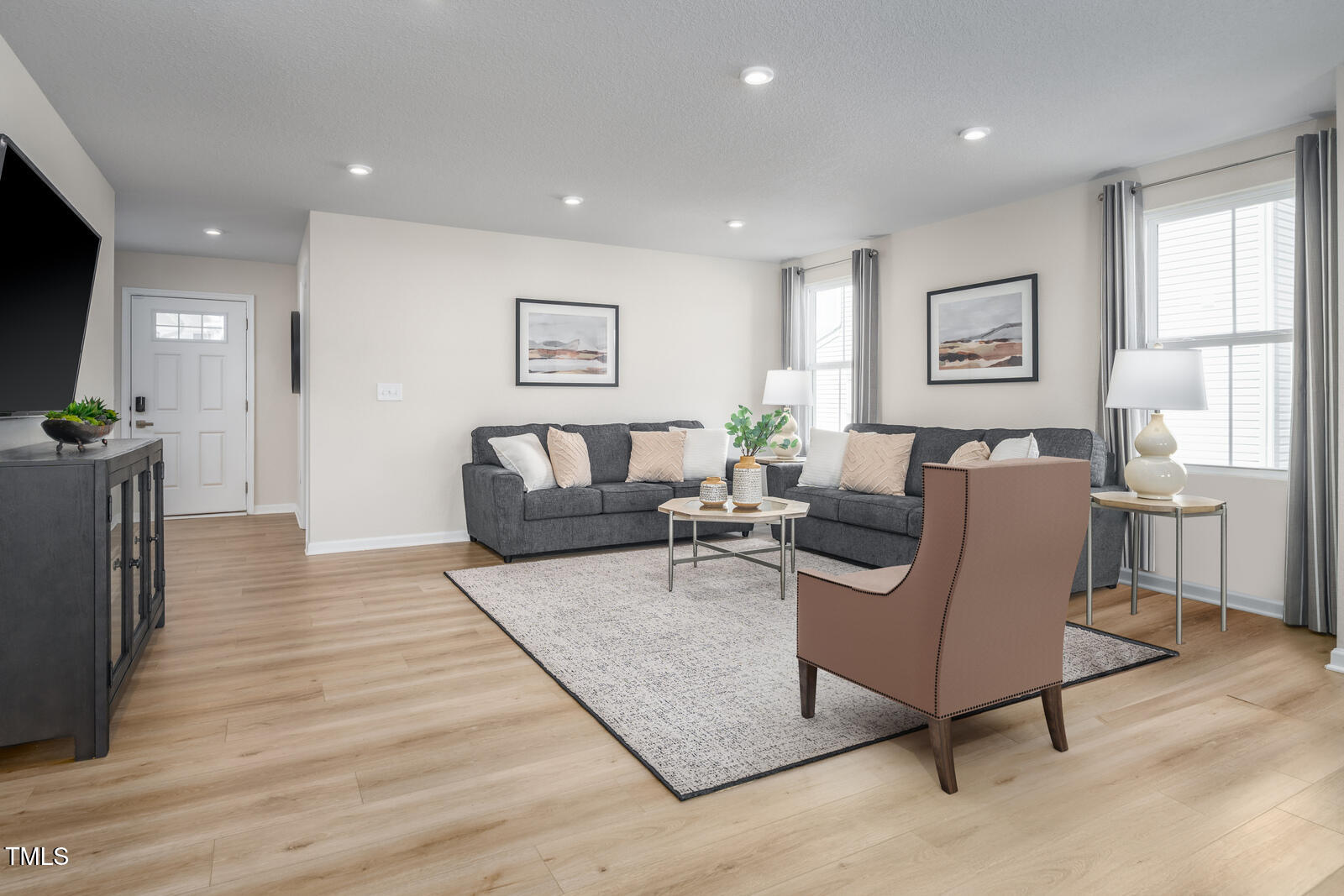 8615 Butterfly Drive Bailey, NC 27807 - Photo 8 of 20 a living room with furniture and a wooden floor