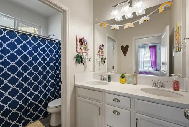 a bed room with furniture and a window