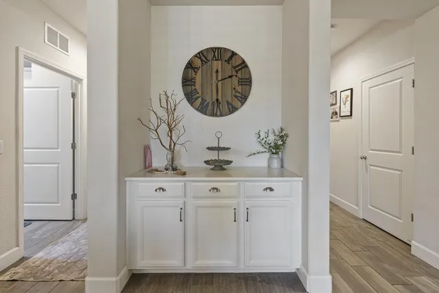 a view of a dining room with furniture and window