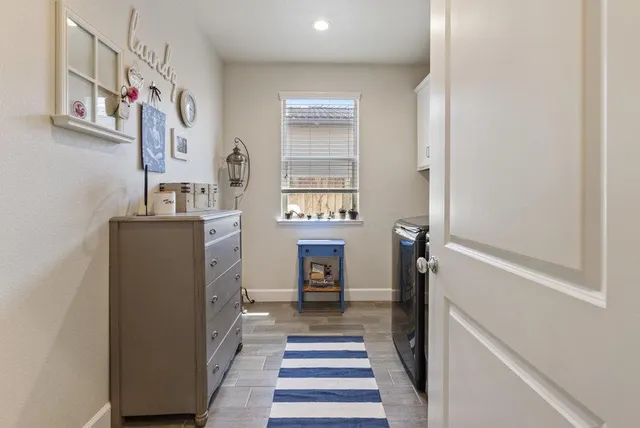 a bathroom with a sink toilet and mirror