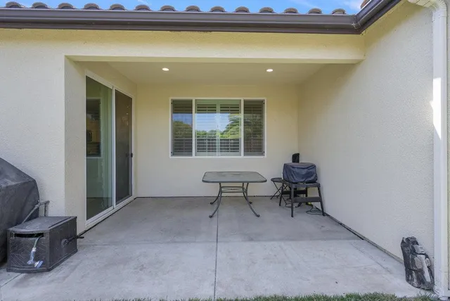 a view of a backyard with a tub