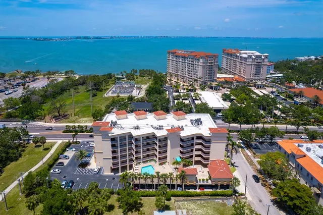 a view of a city with an ocean view