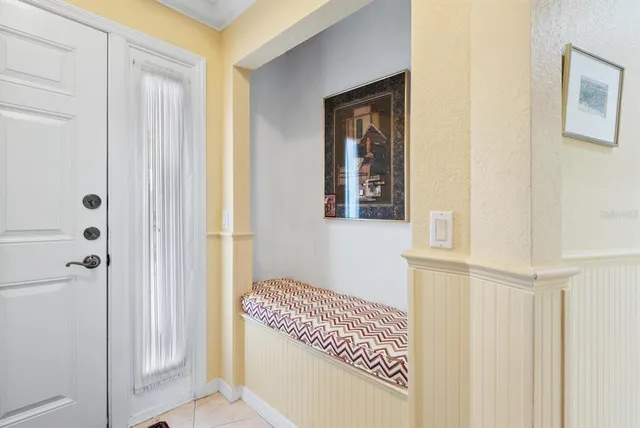 a view of a hallway with front door