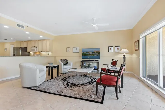 a living room with furniture and a table