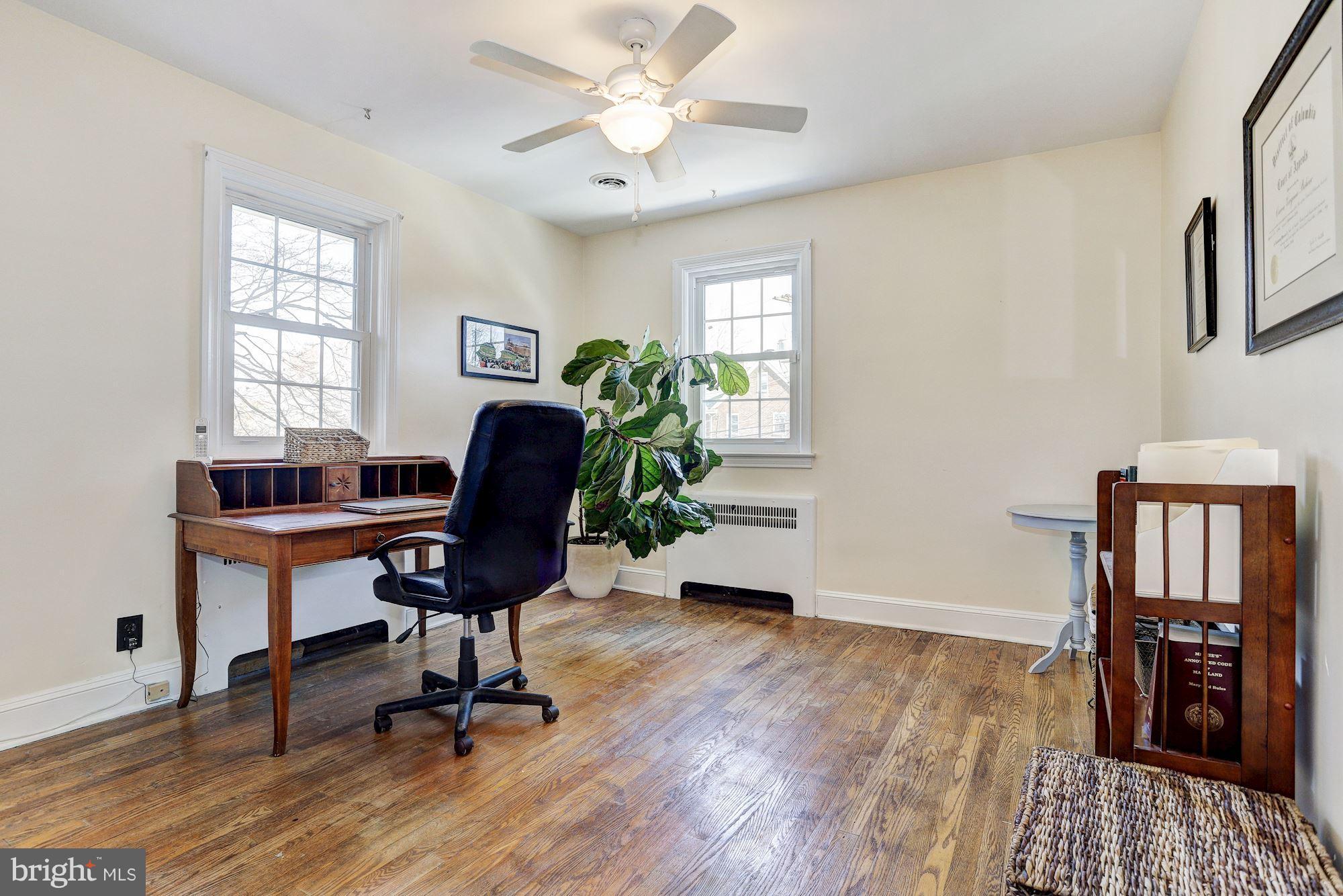408 Dunkirk Road Baltimore, MD 21212 - Photo 13 of 22 a view of a workspace with furniture and a window