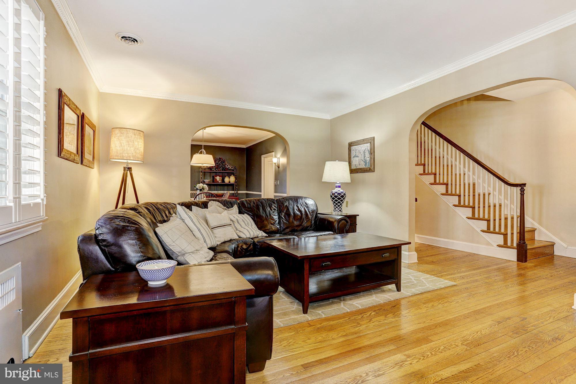 408 Dunkirk Road Baltimore, MD 21212 - Photo 6 of 22 a living room with furniture and a wooden floor