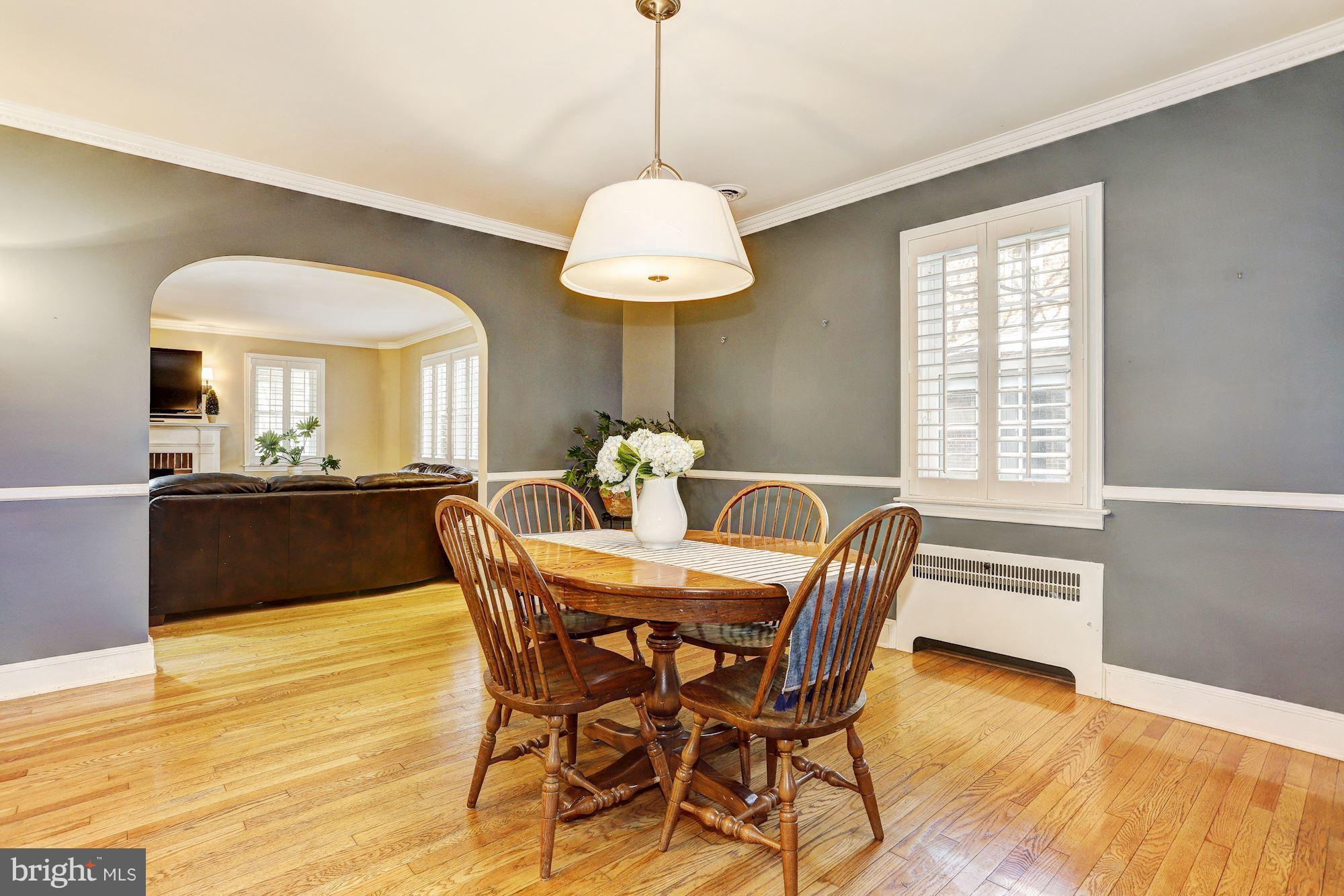 408 Dunkirk Road Baltimore, MD 21212 - Photo 7 of 22 a view of a dining room with furniture window and wooden floor