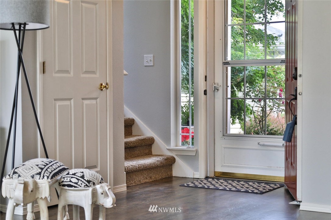 2432 195th Place Southeast, Unit B Bothell, WA 98012 - Photo 3 of 34 a view of entryway and hall with wooden floor