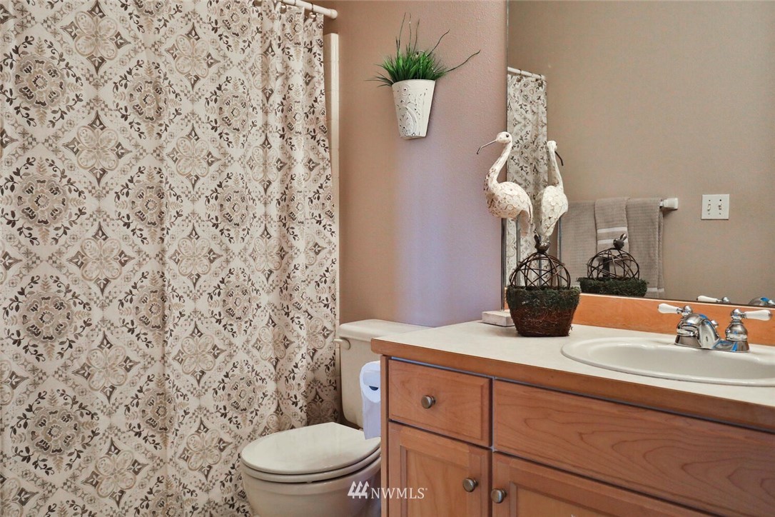 2432 195th Place Southeast, Unit B Bothell, WA 98012 - Photo 25 of 34 a bathroom with a toilet and a sink