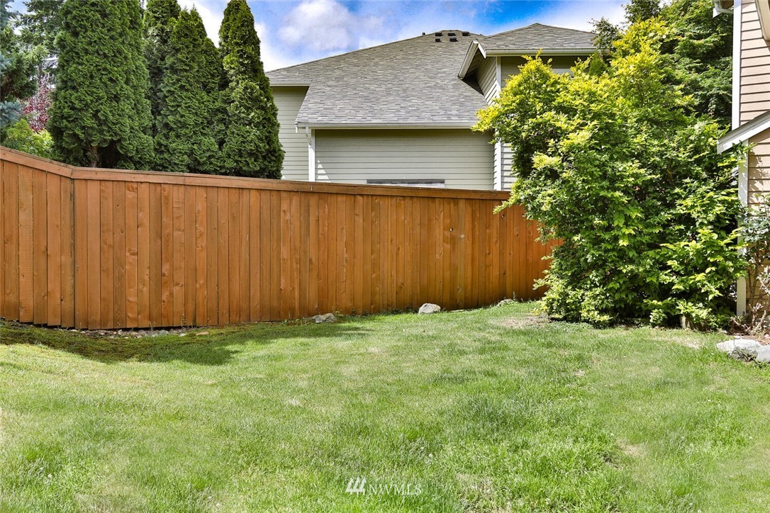 2432 195th Place Southeast, Unit B Bothell, WA 98012 - Photo 32 of 34 a view of a backyard