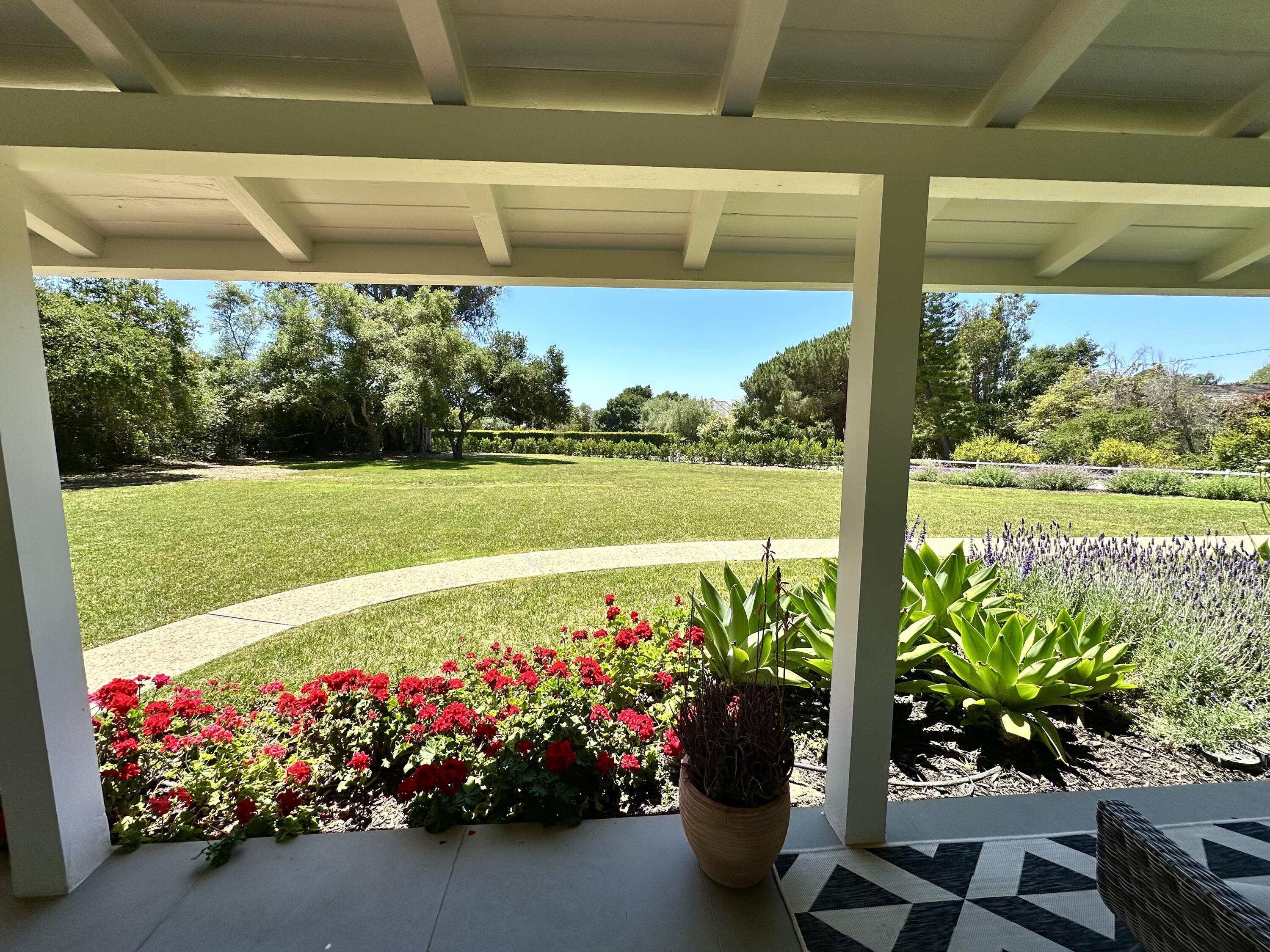 450 Santa Rosa Lane Montecito, CA 93108 - Photo 2 of 16 a view of a room with a large window and wooden floor