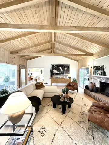 a bedroom with a bed and a mirror