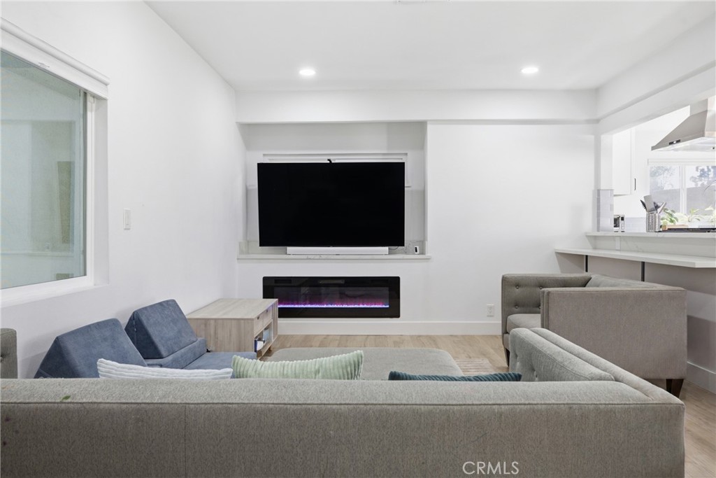 384 Colorado Street Arcadia, CA 91007 - Photo 31 of 51 a living room with furniture and a flat screen tv