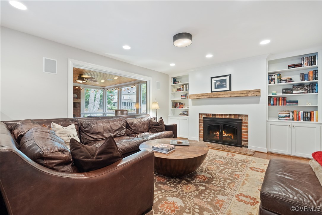 2501 Swanhurst Drive Midlothian, VA 23113 - Photo 17 of 44 a living room with furniture and a fireplace