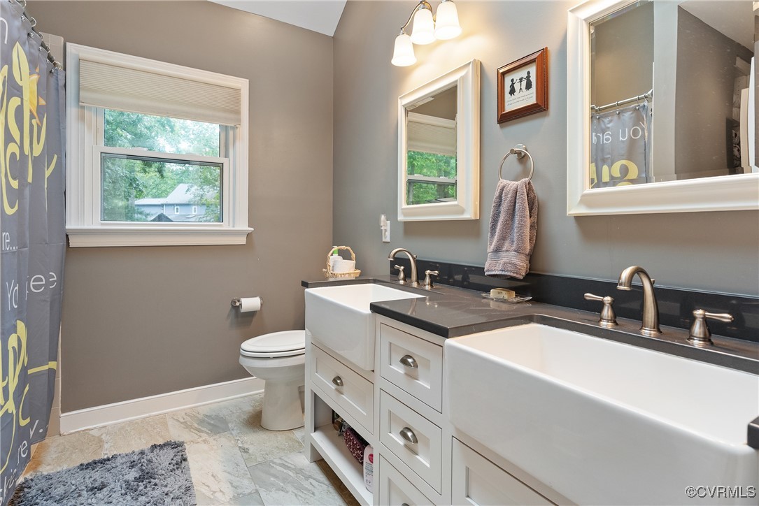 2501 Swanhurst Drive Midlothian, VA 23113 - Photo 33 of 44 a bathroom with a sink and a toilet