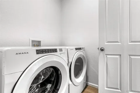 a view of entryway with washer and dryer