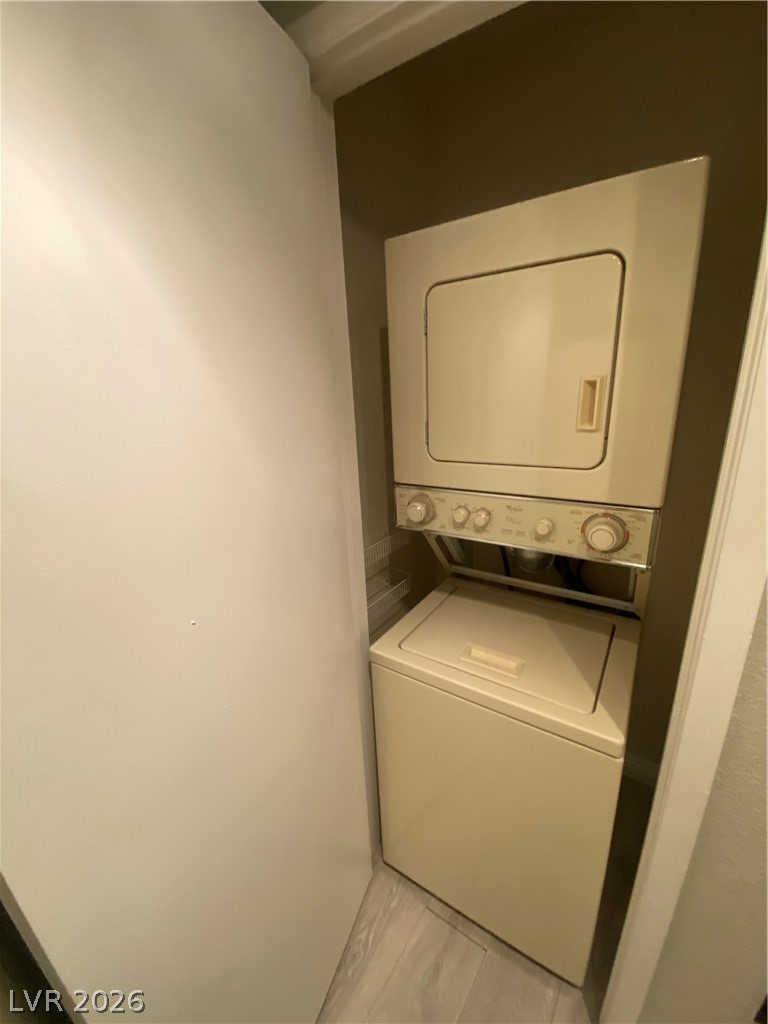 5271 South Lindell Road, Unit 202 Las Vegas, NV 89118 - Photo 14 of 27 A convenient stacked washer and dryer setup provides efficient laundry care.