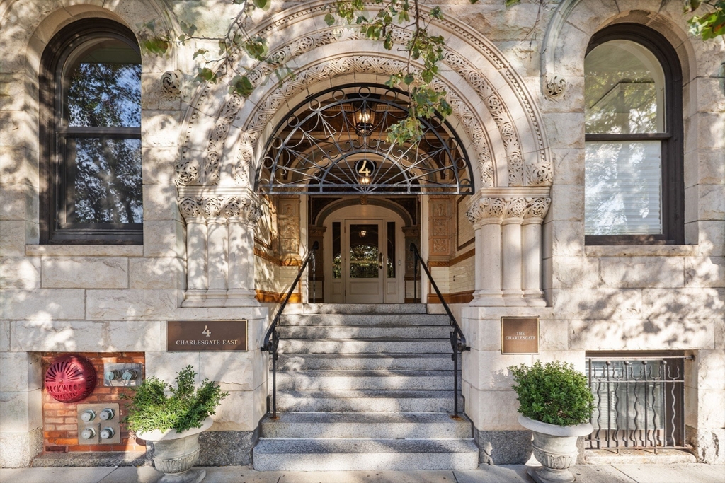 4 Charlesgate East, Unit 601 Boston, MA 02215 - Photo 2 of 33 a view of a fireplace with potted plants