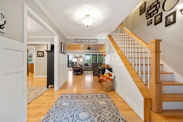 a view of walk in closet with clothes