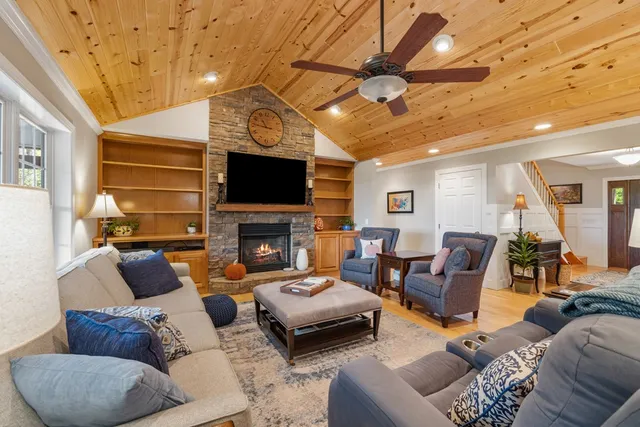 a bathroom with a double vanity sink mirror double and bathtub