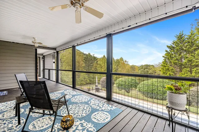 a bedroom with a bed and a night stand