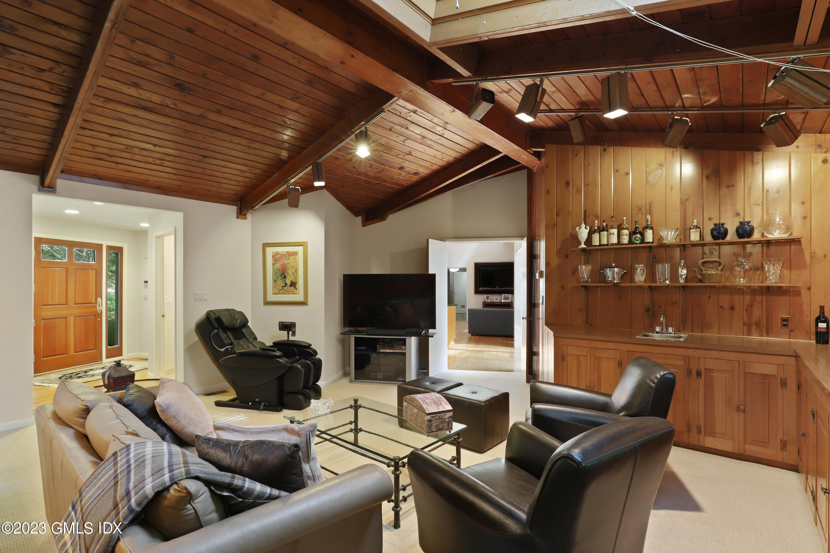 31 Ferncliff Road Cos Cob, CT 06807 - Photo 15 of 28 a living room with furniture and a flat screen tv