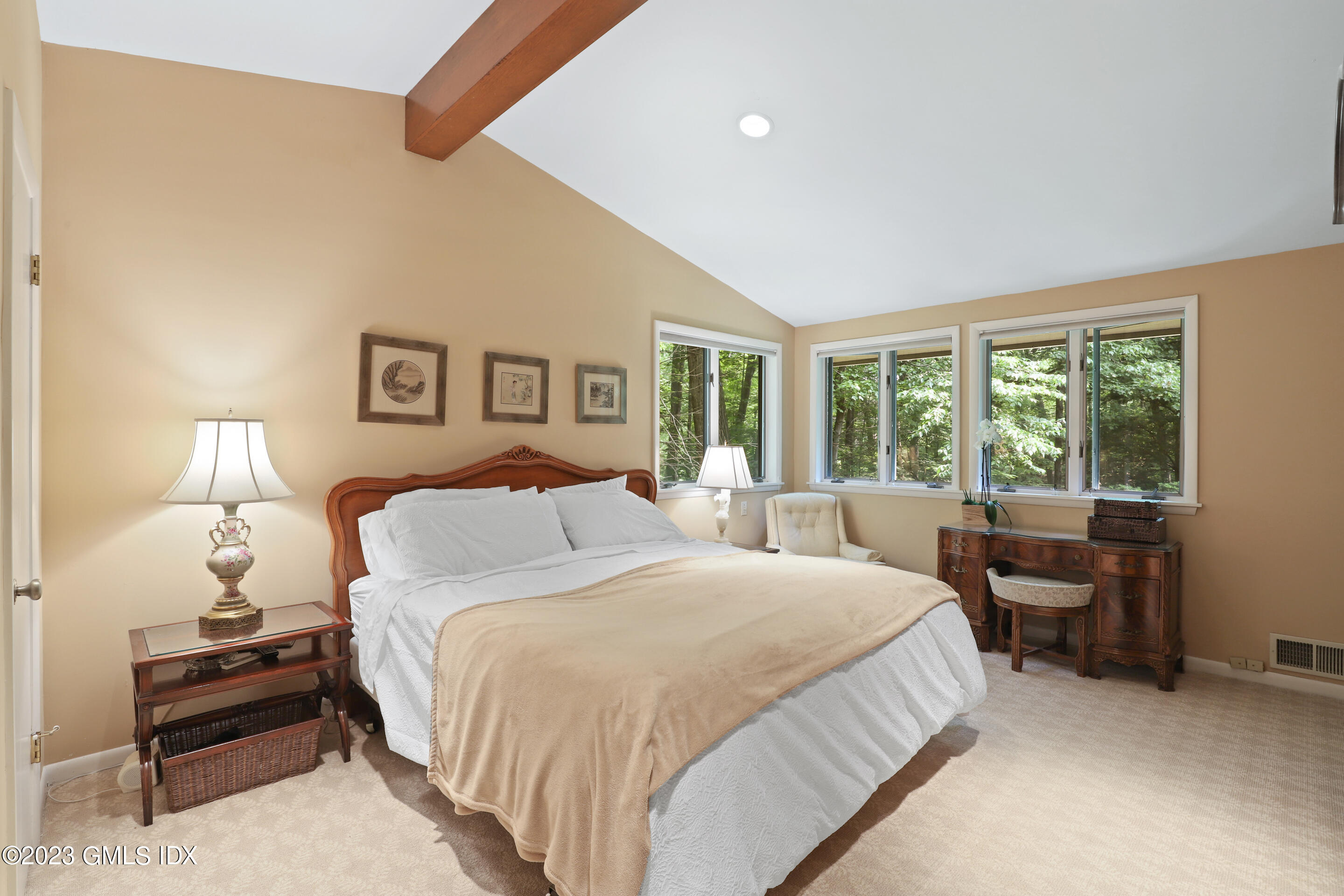 31 Ferncliff Road Cos Cob, CT 06807 - Photo 16 of 28 a bedroom with a bed and a large window
