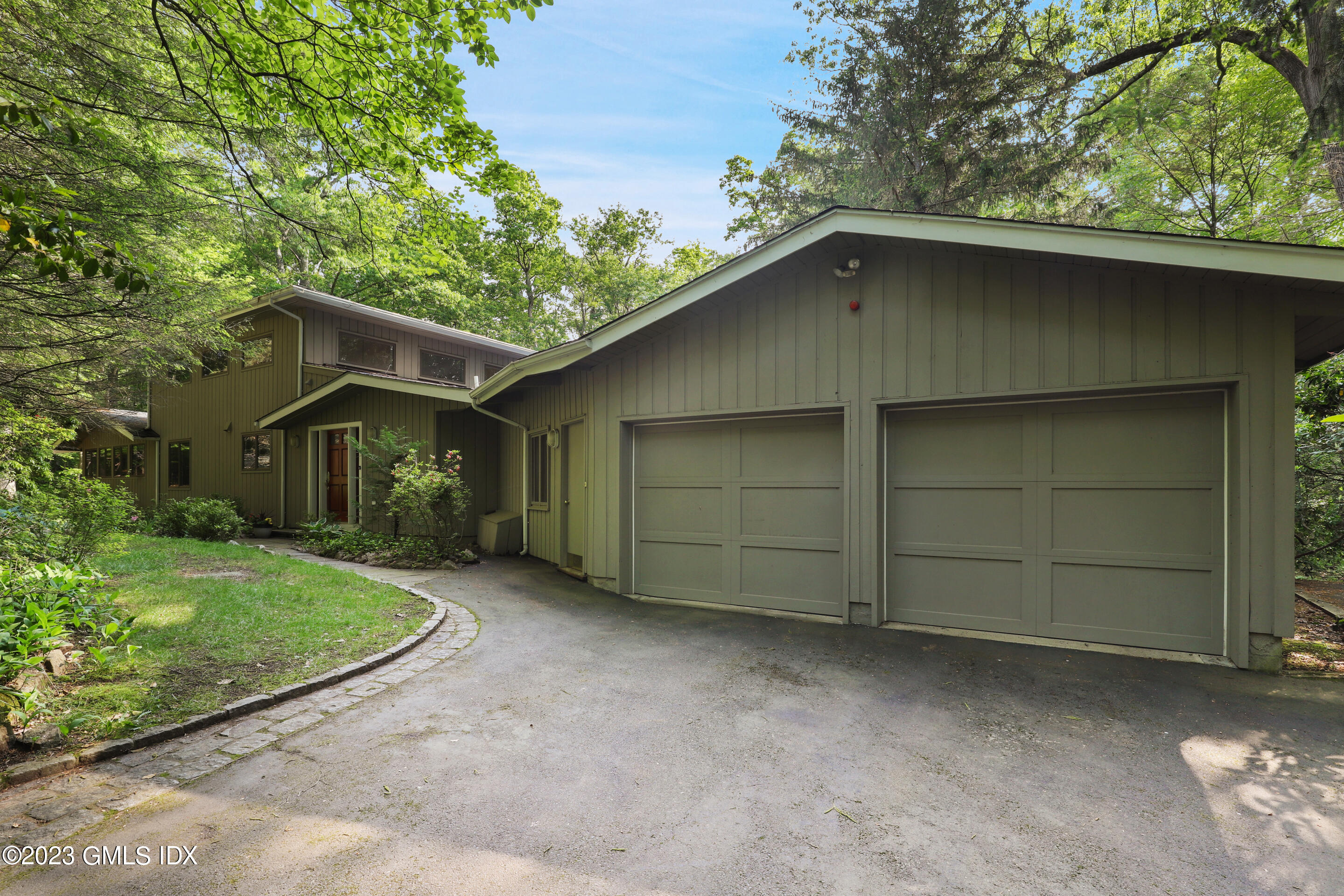 31 Ferncliff Road Cos Cob, CT 06807 - Photo 2 of 28 a house with a outdoor space