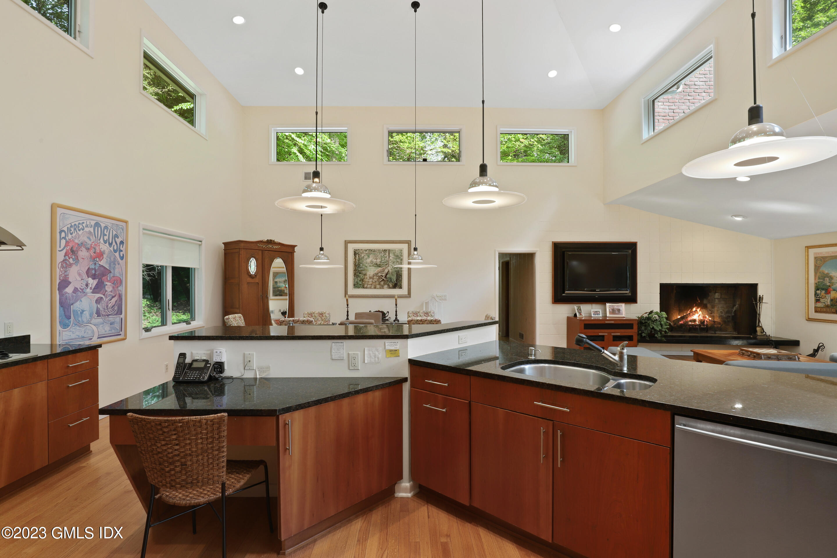 31 Ferncliff Road Cos Cob, CT 06807 - Photo 4 of 28 a kitchen with granite countertop a sink a counter top space appliances and cabinets