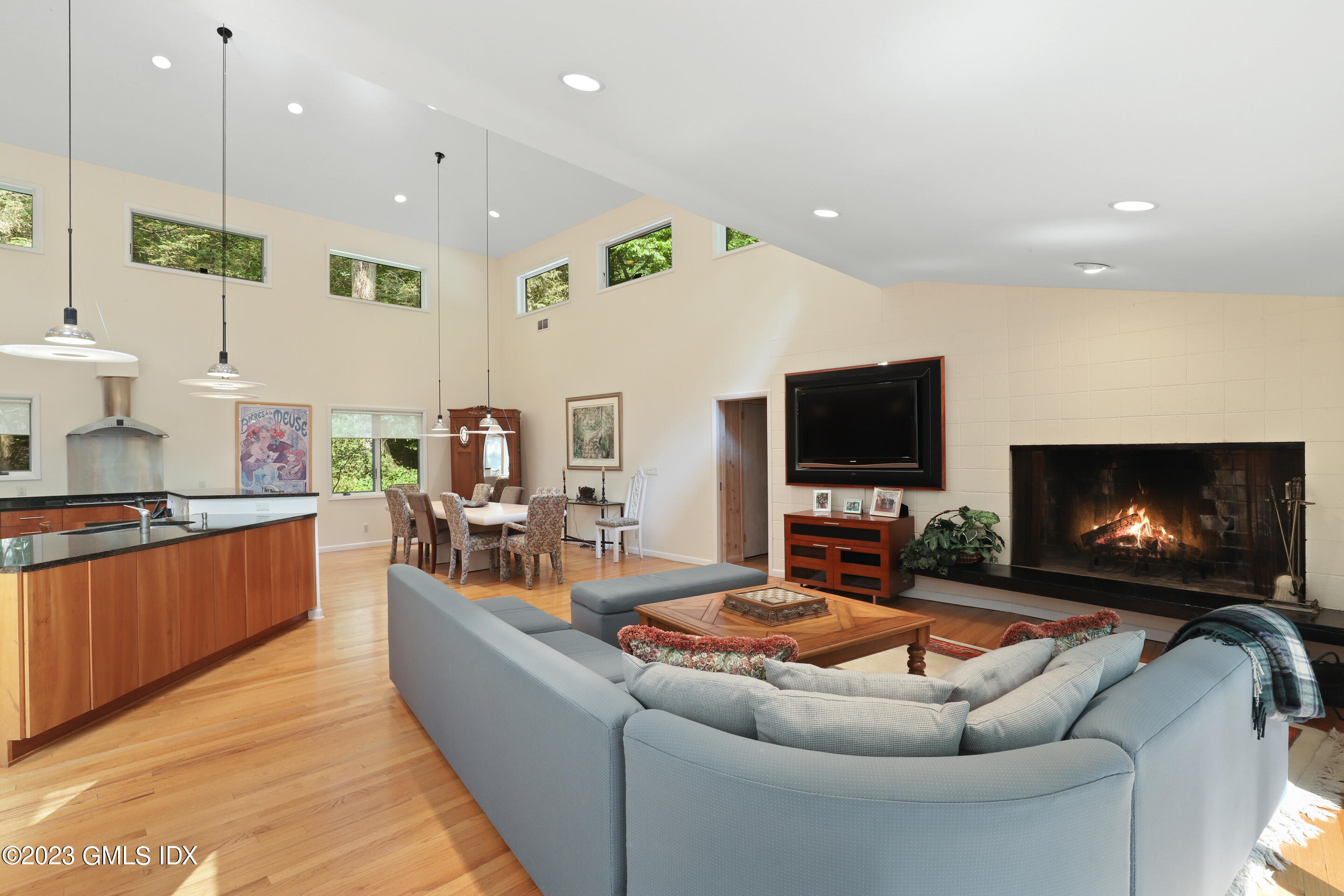 31 Ferncliff Road Cos Cob, CT 06807 - Photo 6 of 28 a living room with furniture and a flat screen tv