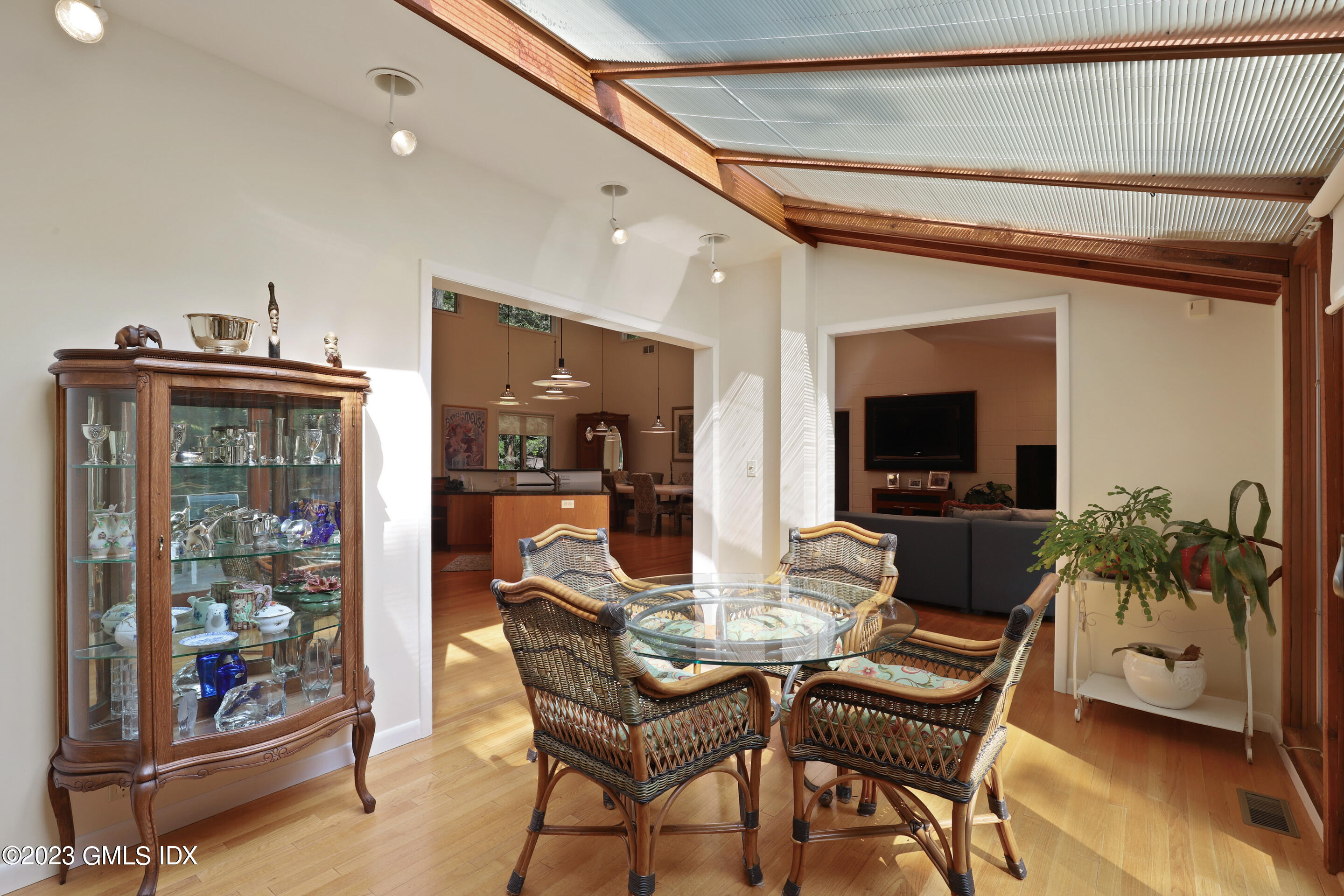 31 Ferncliff Road Cos Cob, CT 06807 - Photo 8 of 28 a view of a dining room with furniture and a potted plant