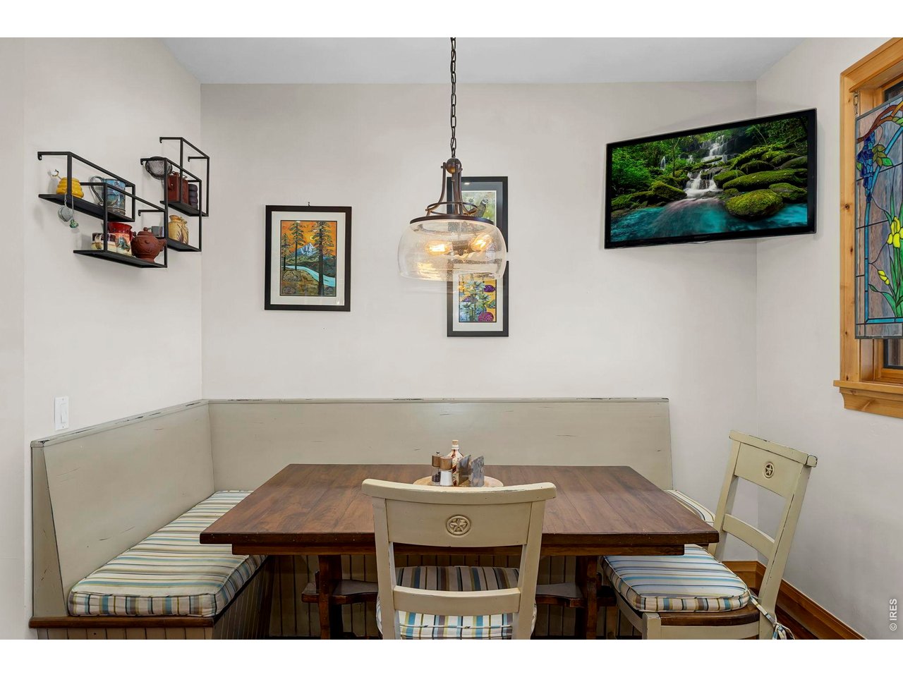 3135 11th Street Boulder, CO 80304 - Photo 16 of 50 a dining room with furniture and wooden floor