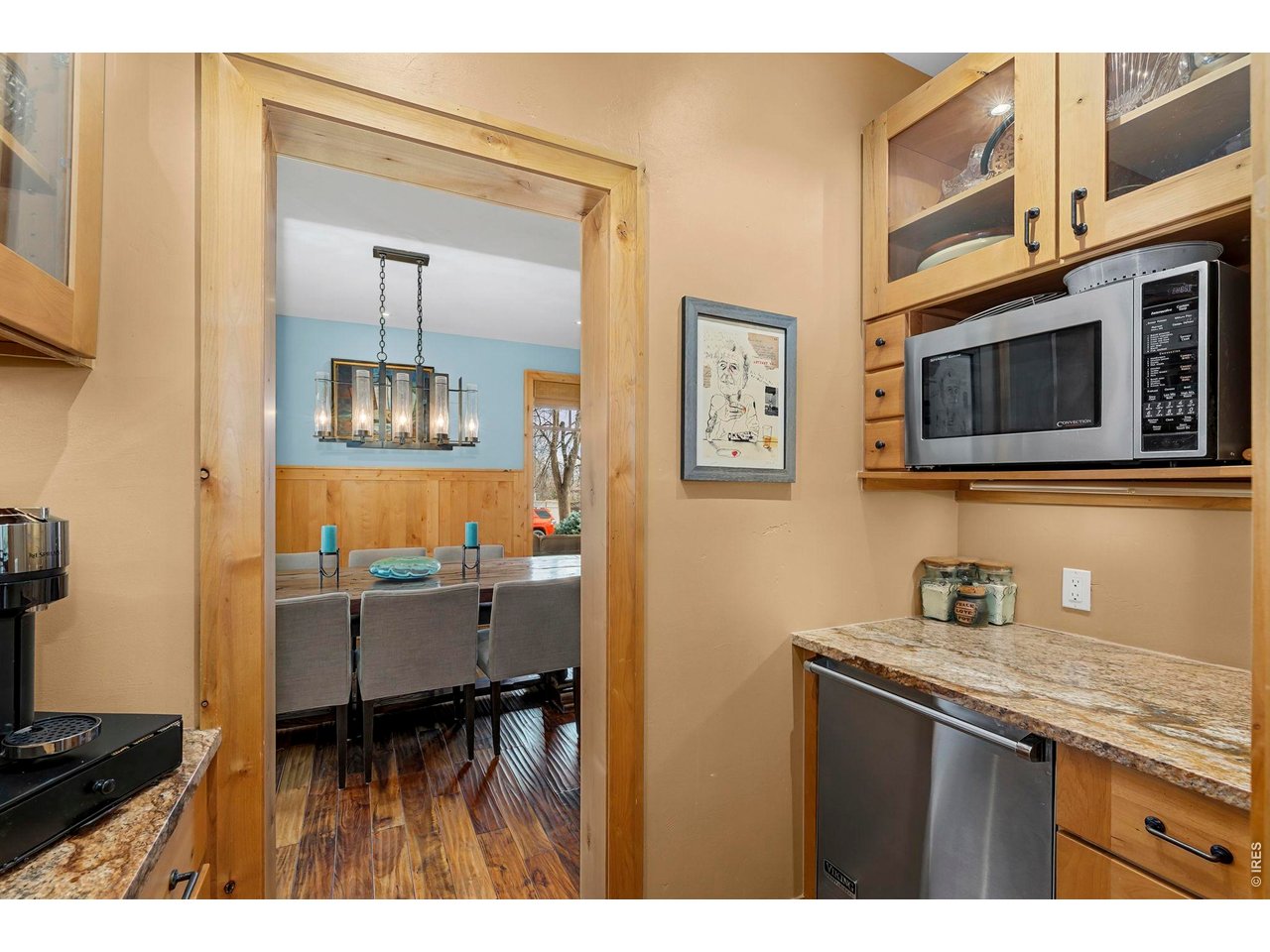 3135 11th Street Boulder, CO 80304 - Photo 18 of 50 a kitchen with cabinets and chair