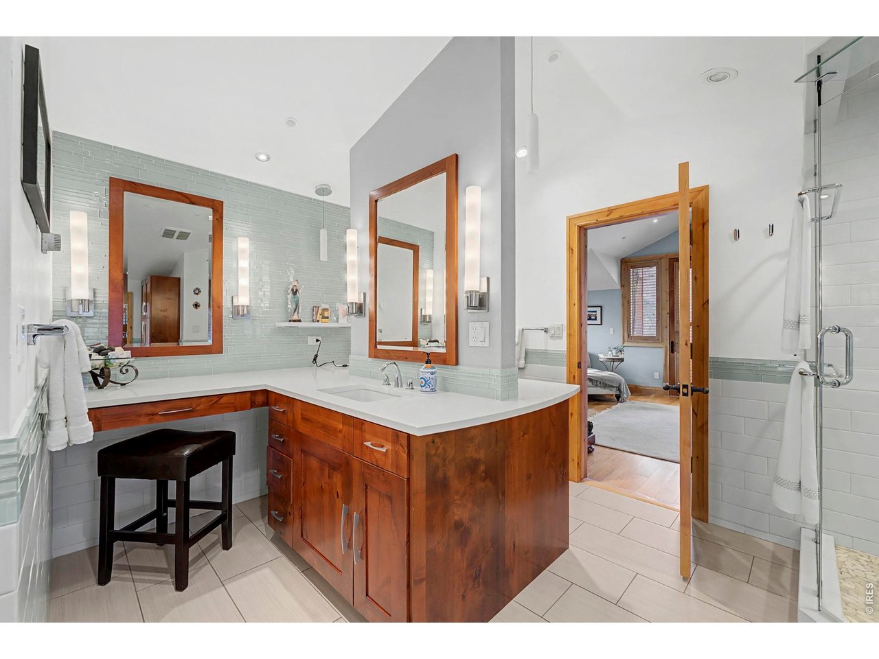 3135 11th Street Boulder, CO 80304 - Photo 31 of 50 a large bathroom with a sink and a mirror