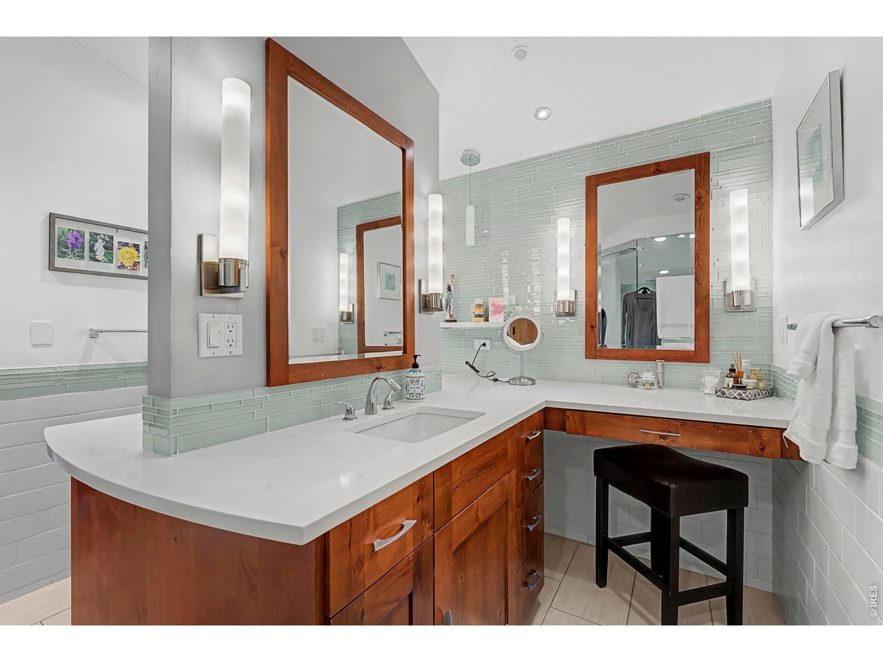 3135 11th Street Boulder, CO 80304 - Photo 33 of 50 a bathroom with a sink and a mirror