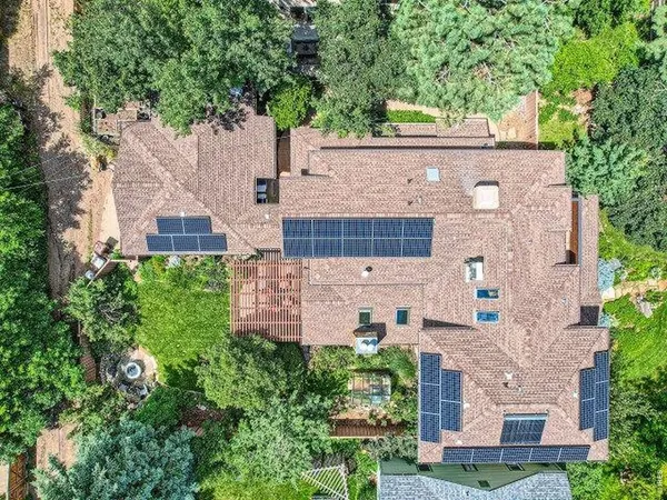 aerial view of a house with a garden