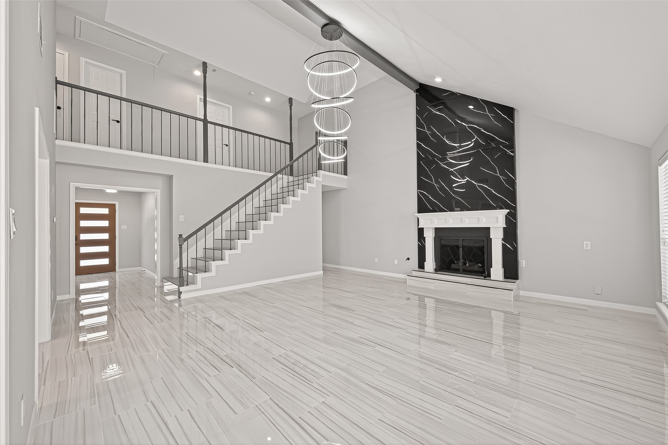 11506 Colonial Trail Drive Houston, TX 77066 - Photo 14 of 42 a view of an empty room with wooden floor and a fireplace