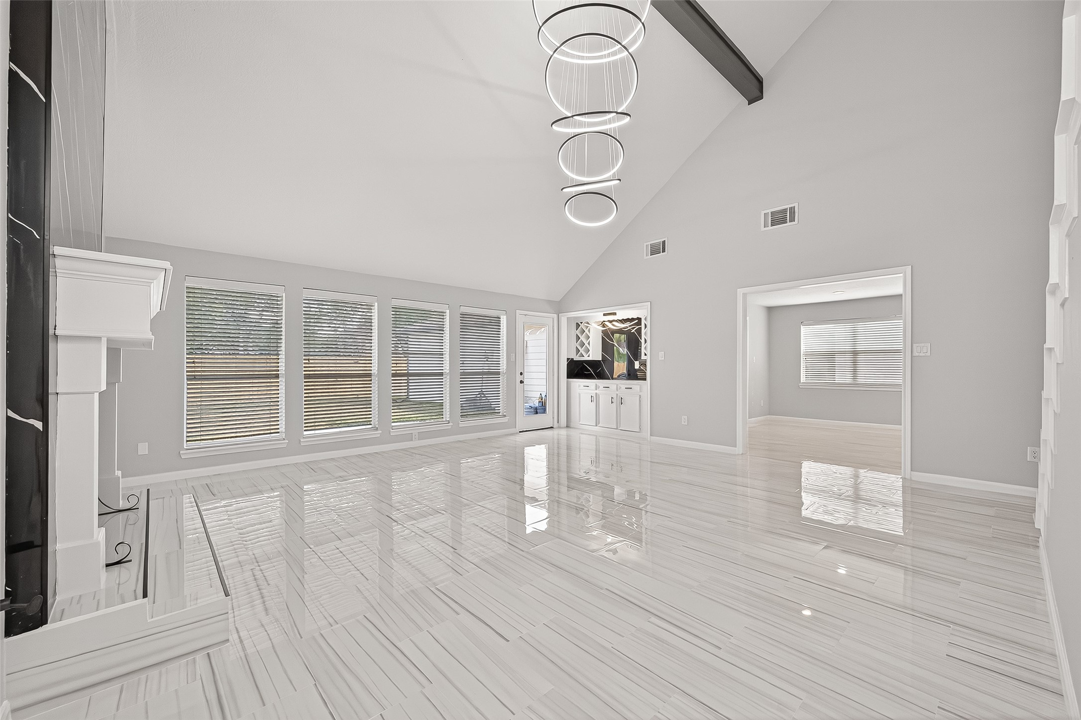 11506 Colonial Trail Drive Houston, TX 77066 - Photo 16 of 42 a view of an empty room with wooden floor and a window