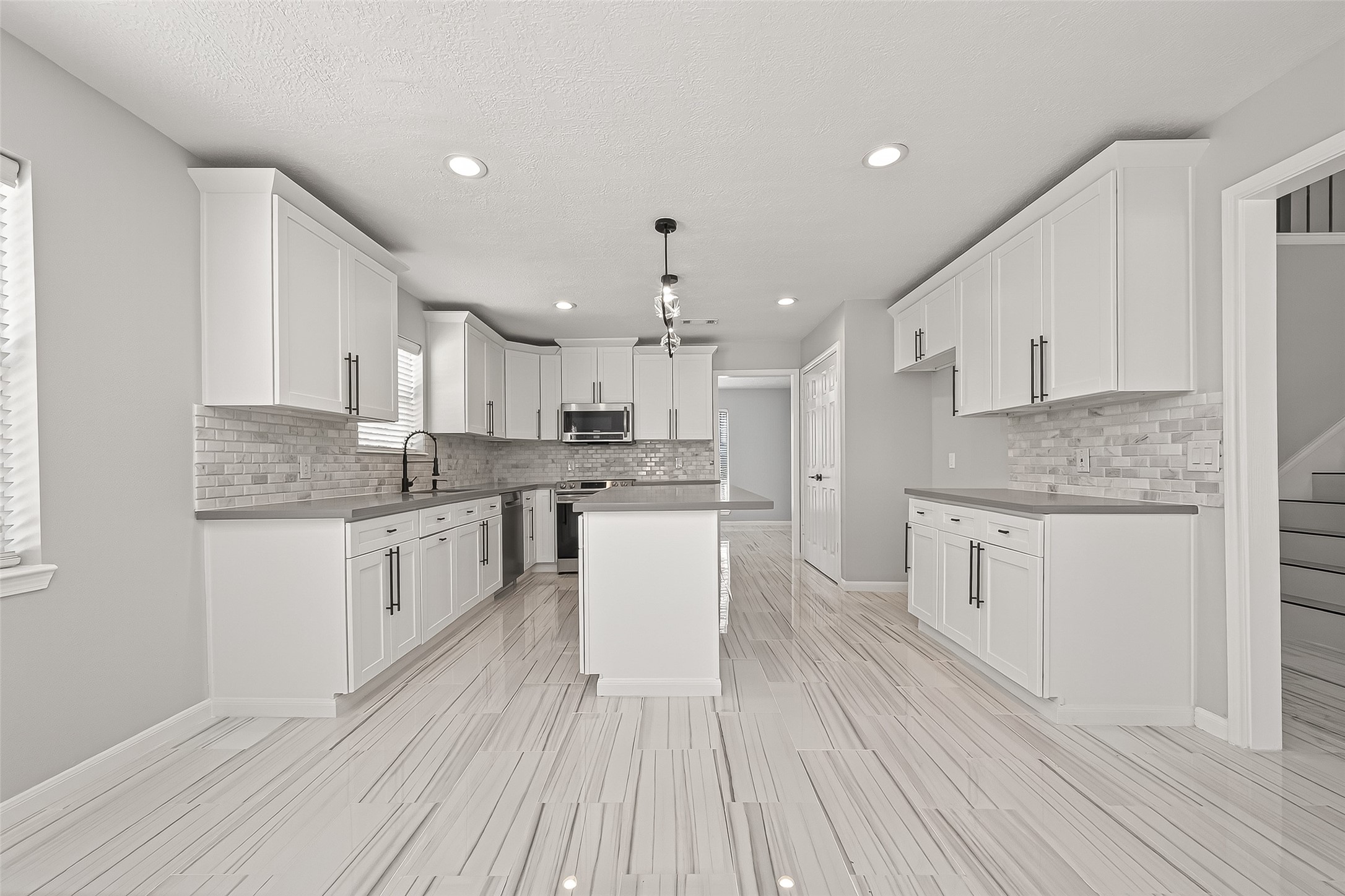 11506 Colonial Trail Drive Houston, TX 77066 - Photo 18 of 42 This is the kitchen you've dreamed of—a bright, sleek, and highly functional space perfect for both the everyday chef and the serious entertainer.