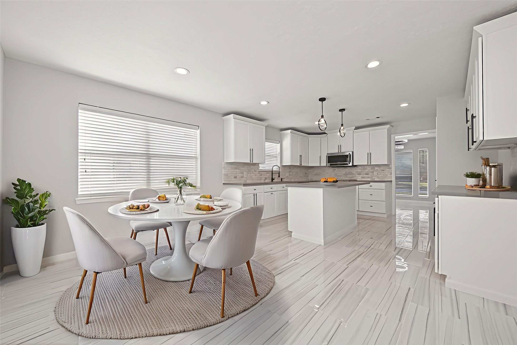 11506 Colonial Trail Drive Houston, TX 77066 - Photo 21 of 42 a kitchen with granite countertop white cabinets and stainless steel appliances