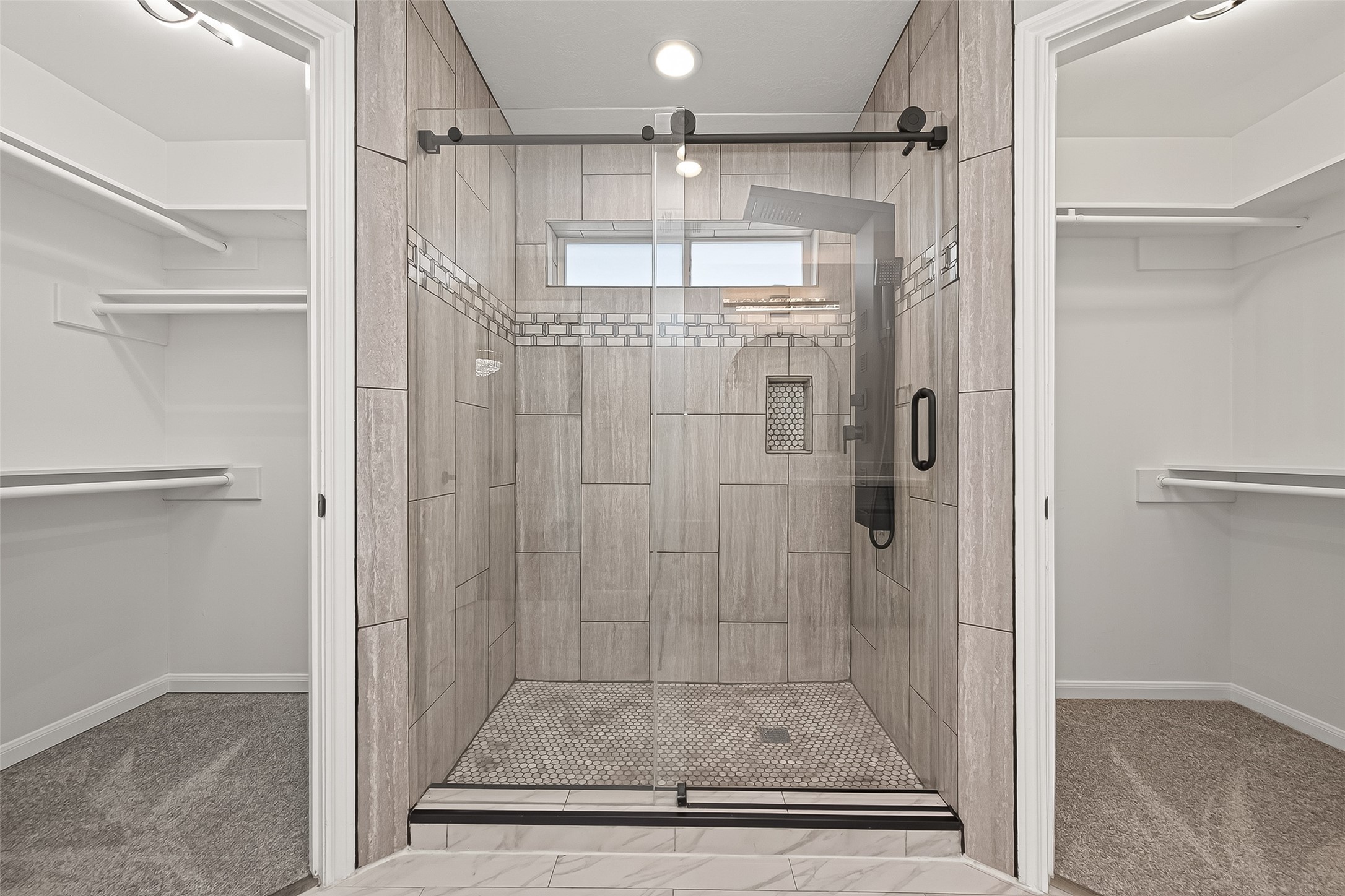 11506 Colonial Trail Drive Houston, TX 77066 - Photo 26 of 42 a bathroom with a glass shower door