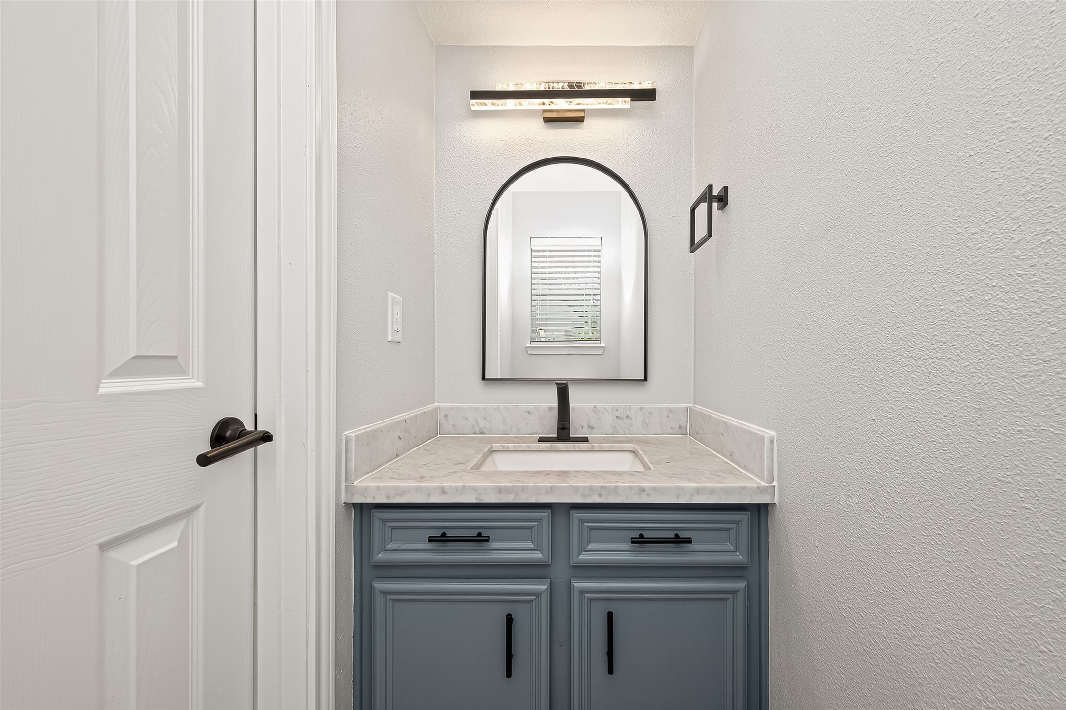 11506 Colonial Trail Drive Houston, TX 77066 - Photo 30 of 42 Even the half bath is a statement of style! Thoughtfully designed and strategically placed, this powder room offers comfort and convenience for your guests.