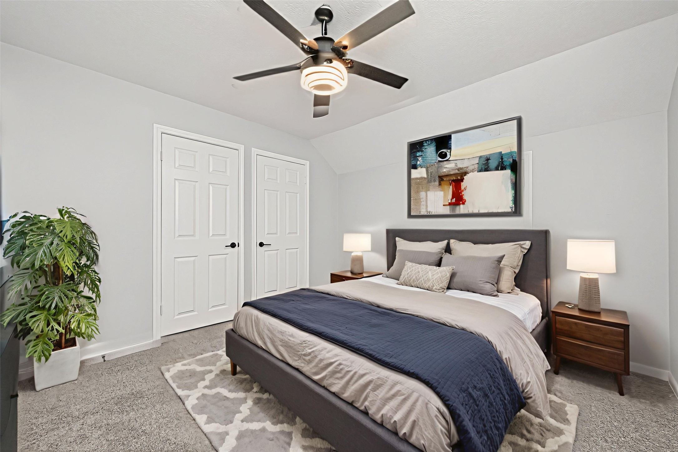 11506 Colonial Trail Drive Houston, TX 77066 - Photo 32 of 42 a bedroom with bed and a chandelier