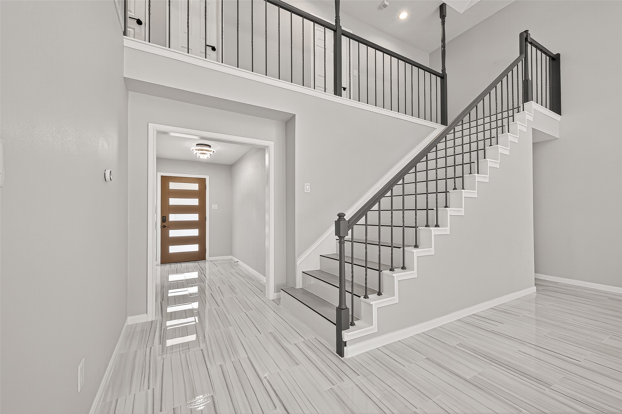 11506 Colonial Trail Drive Houston, TX 77066 - Photo 9 of 42 a view of entryway with wooden floor and stairs