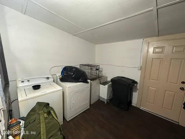 a utility room with dryer and washer