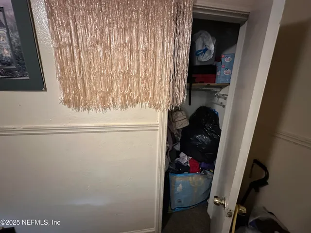 a close up of a sink and storage