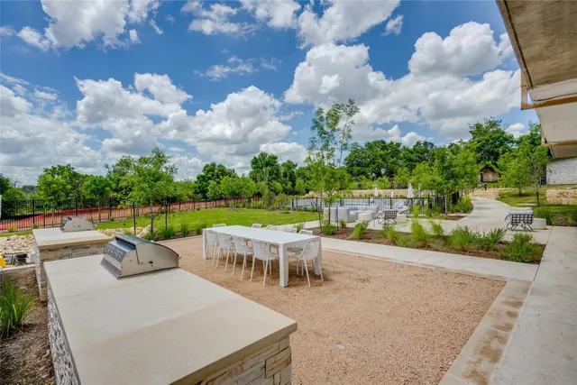 a garden view with a seating space